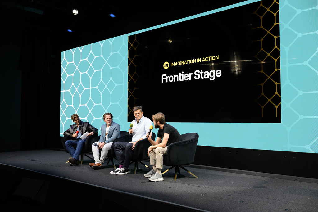The Frontier Stage at Google Bay View from the audience: the Imagination in Action screen above the four of us on stage.